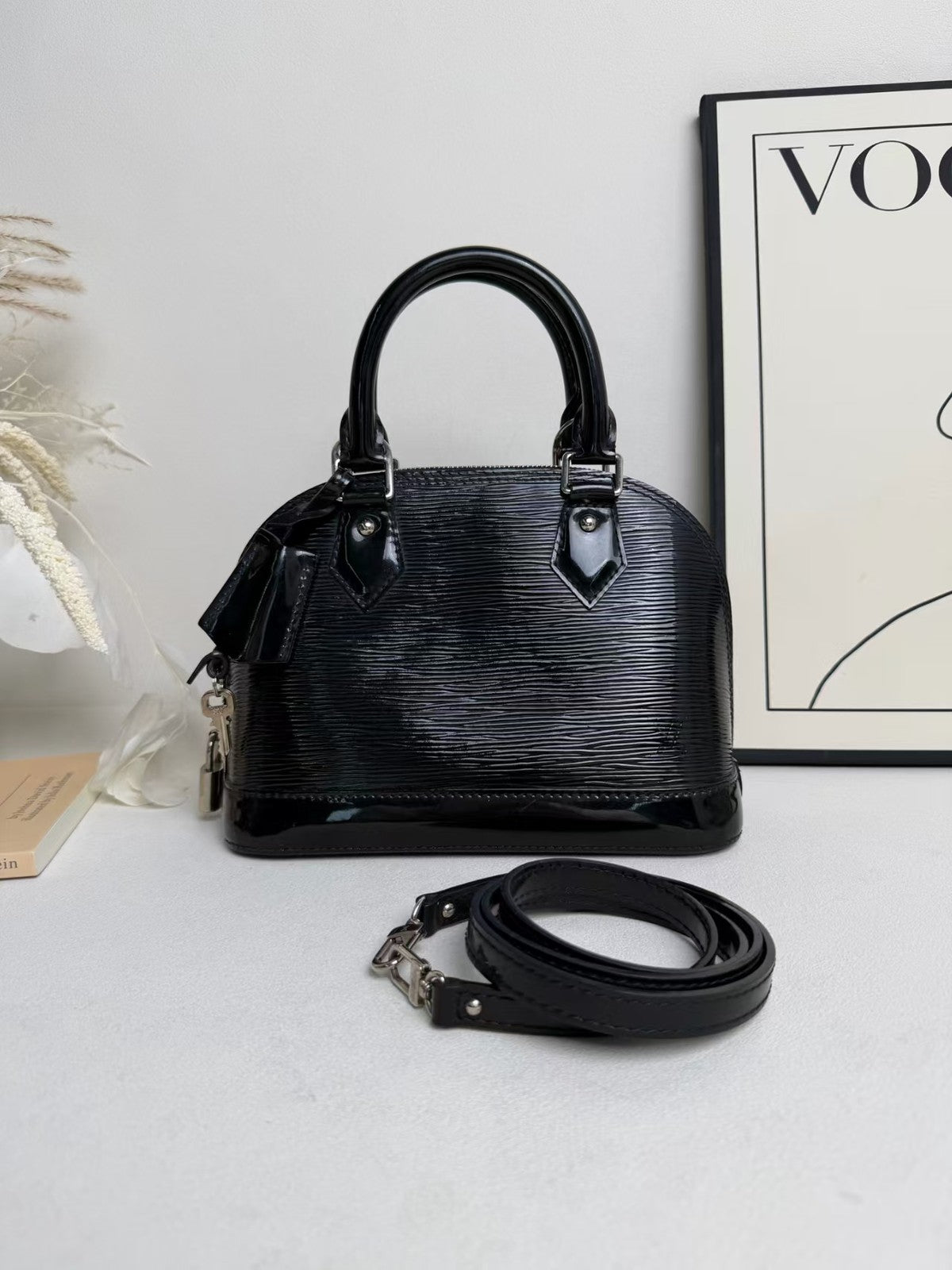 Louis Vuitton M53750 AlmaBB Solid Black Gloss Epi Leather Mini Handbag Crossbody - photo 1 of 7